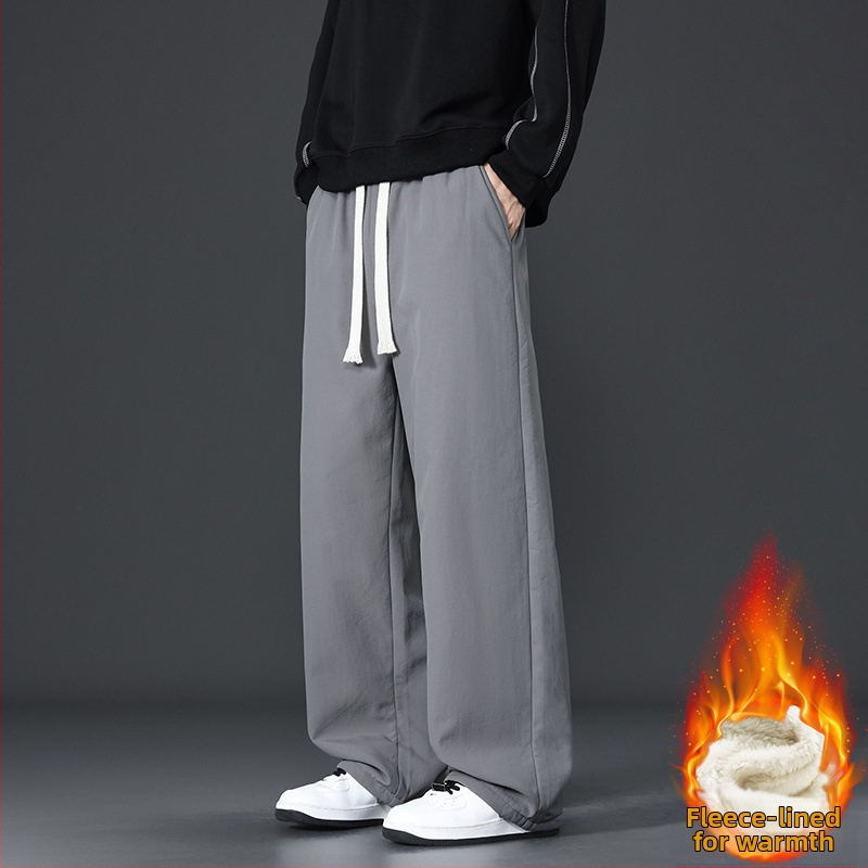 Laiakujulised nailonist sportpüksid keskmise vöökohtaga, mikroelastsus, igapäevane sportlik stiil, talv 2025