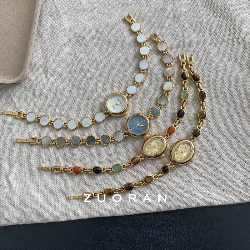 Дамски кварцов часовник с циферблат от естествена перла, кръгъл корпус, корпус и ремък от сплав, водоустойчив до 30 м