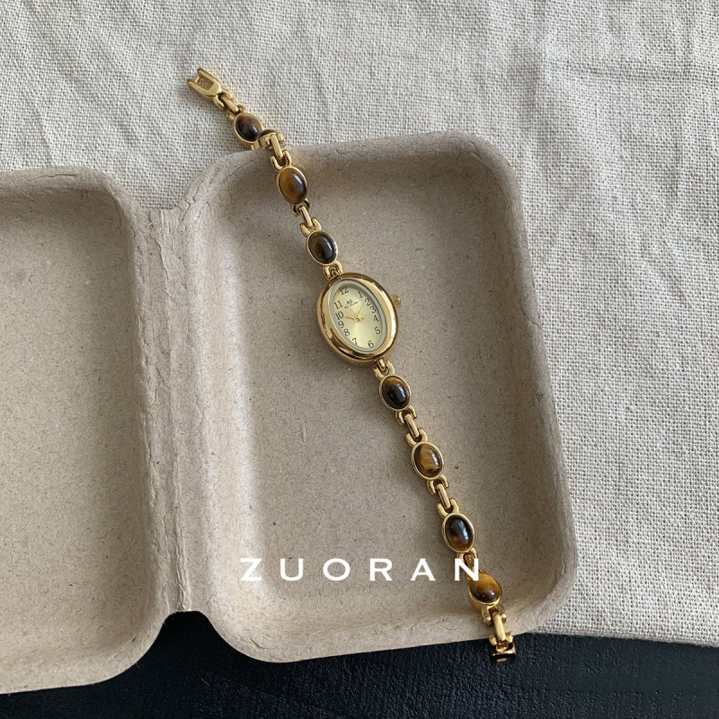 Дамски кварцов часовник с циферблат от естествена перла, кръгъл корпус, корпус и ремък от сплав, водоустойчив до 30 м