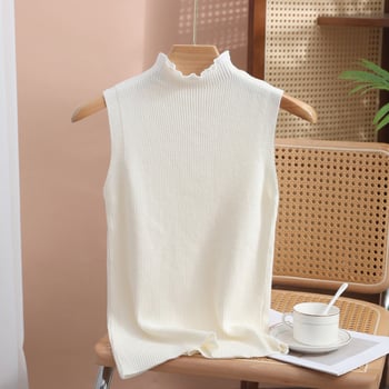 Női kötött ujjatlan alapszínű felső csipkés álló gallérral, egyszínű poliészter kötés, mikroelasztikusság