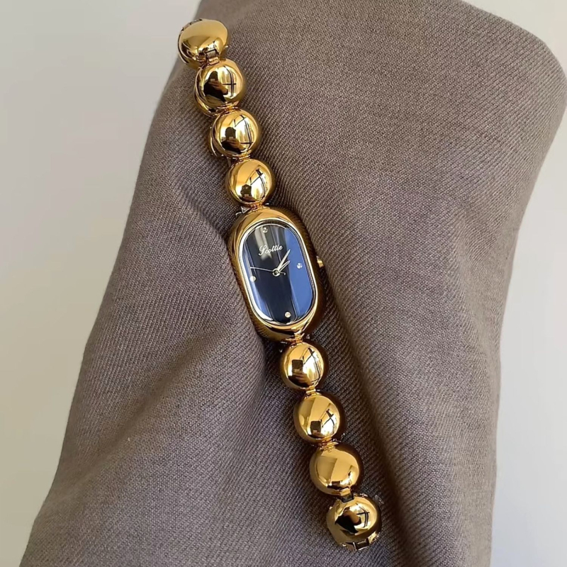 Scottie Shigodi 9731b Ženski ovalni kvarcni sat, Kvarcni mehanizam Shigodi, Ovalni brojčanik, Kućište od legure, Vodootporan do 30m