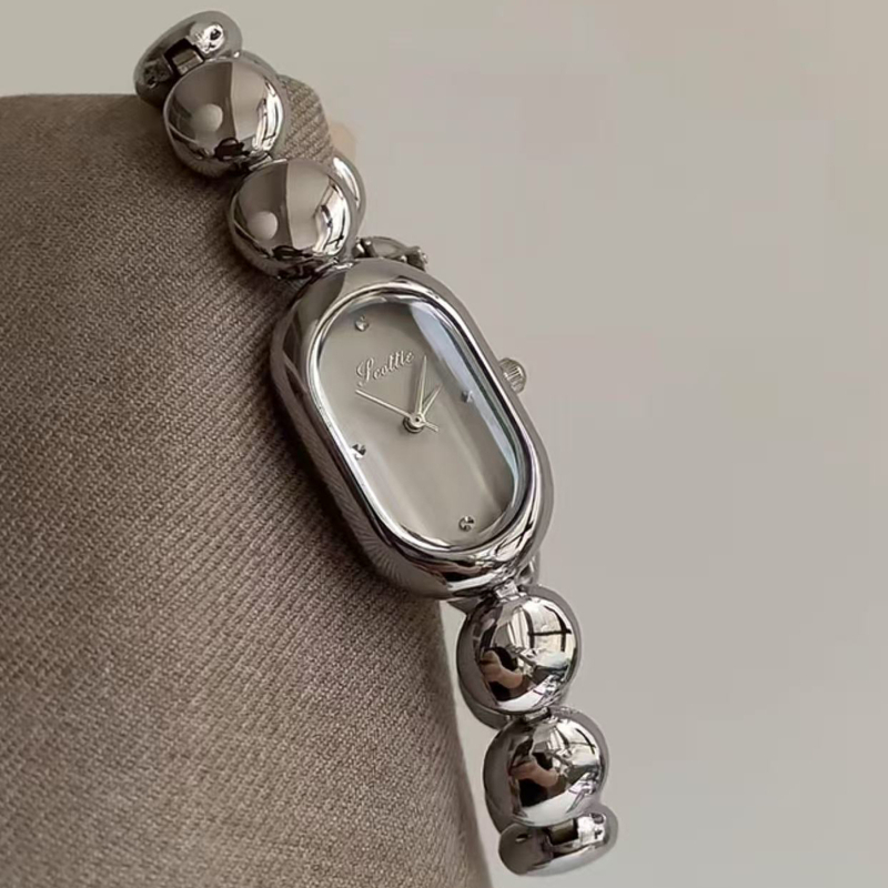 Scottie Shigodi 9731b Ženski ovalni kvarcni sat, Kvarcni mehanizam Shigodi, Ovalni brojčanik, Kućište od legure, Vodootporan do 30m