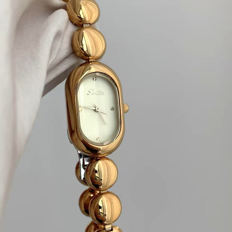 Scottie Shigodi 9731b Ženski ovalni kvarcni sat, Kvarcni mehanizam Shigodi, Ovalni brojčanik, Kućište od legure, Vodootporan do 30m