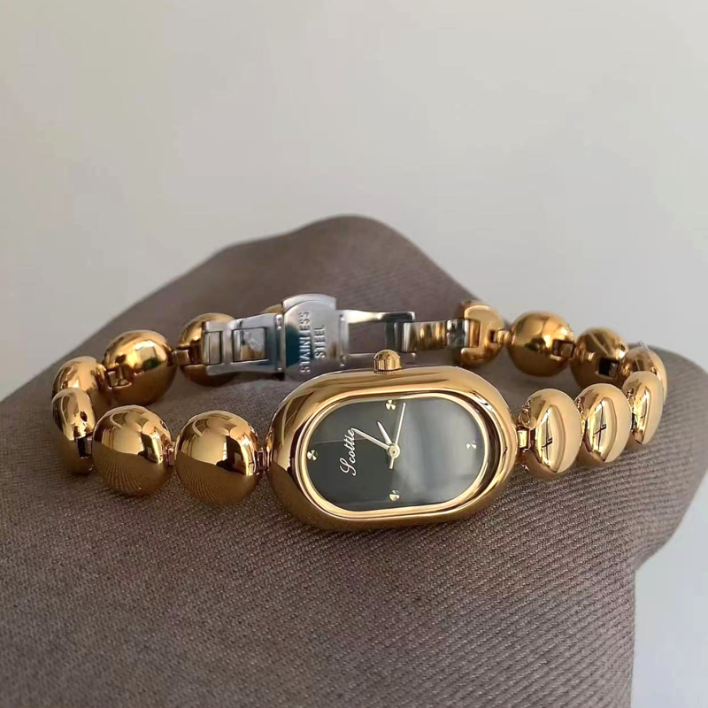 Scottie Shigodi 9731b Ženski ovalni kvarcni sat, Kvarcni mehanizam Shigodi, Ovalni brojčanik, Kućište od legure, Vodootporan do 30m