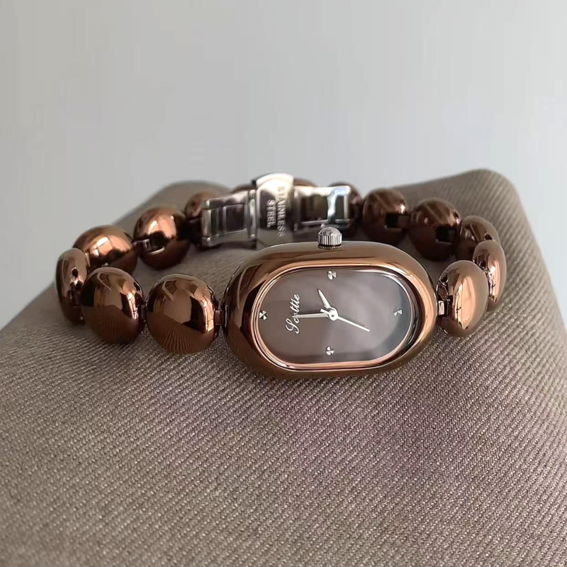 Scottie Shigodi 9731b Ženski ovalni kvarcni sat, Kvarcni mehanizam Shigodi, Ovalni brojčanik, Kućište od legure, Vodootporan do 30m