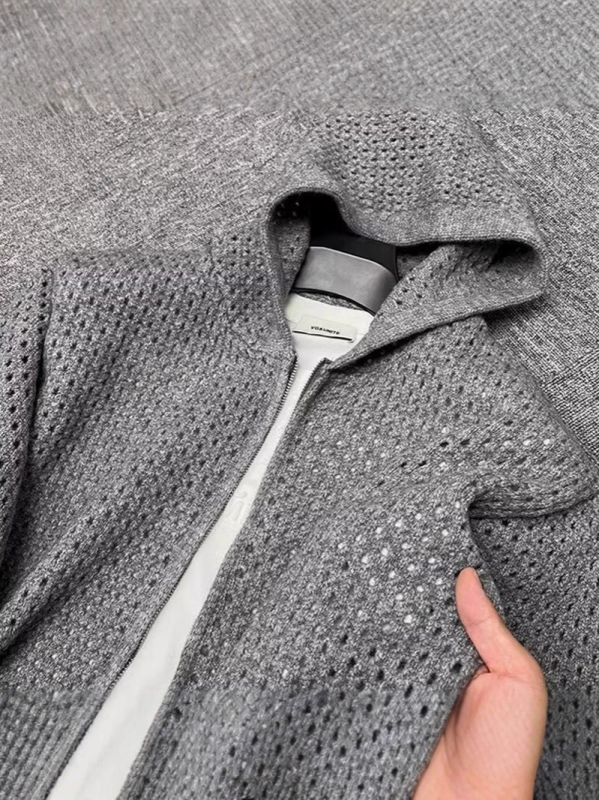 Pleteni kardigan s kapuljom, prozračni uzorak, opušteni kroj, dugi rukavi, mješavina pamuka s 60% poliesterom