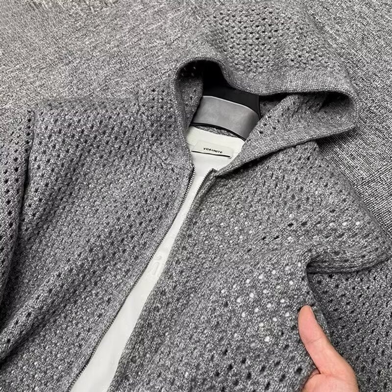Pleteni kardigan s kapuljom, prozračni uzorak, opušteni kroj, dugi rukavi, mješavina pamuka s 60% poliesterom