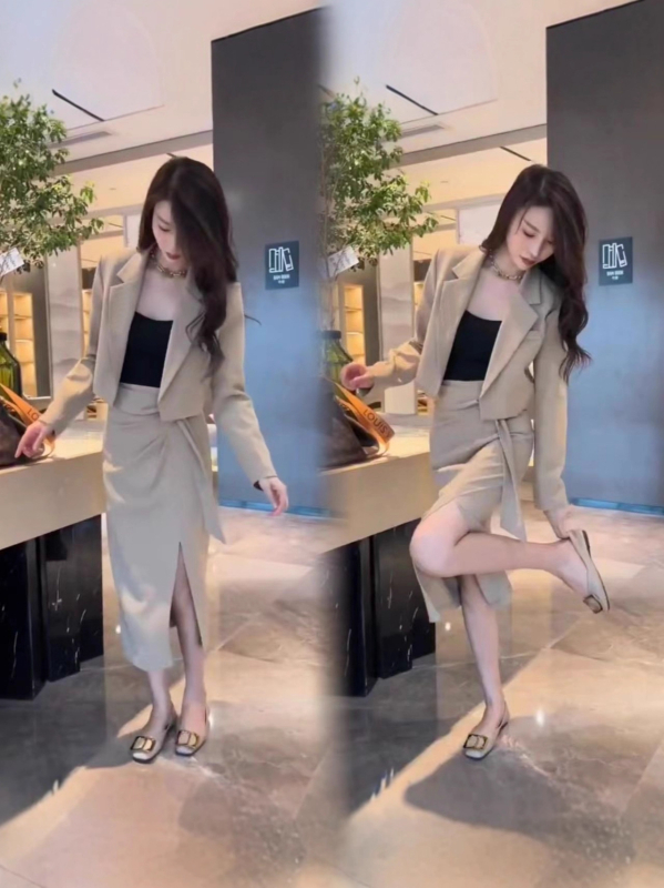 Divdaļīgs sieviešu kostīms: top ar garām piedurknēm un midi svārki ar atvērumu, vienkrāsains poliesters, 70–80% poliestera saturs, biroja ikdienas stilam