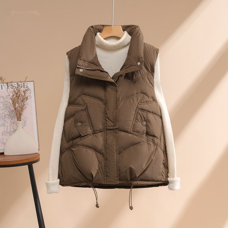 Ženska vesta sa stojećim ovratnikom, A-linijski kroj, poliester tkanina 90–95%, ispuna: Chiasa