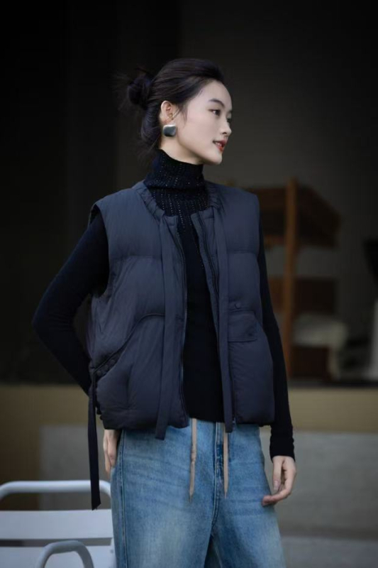 Ženska vesta s kačjim perjem, okrugli vrat, zip, slobodan kroj