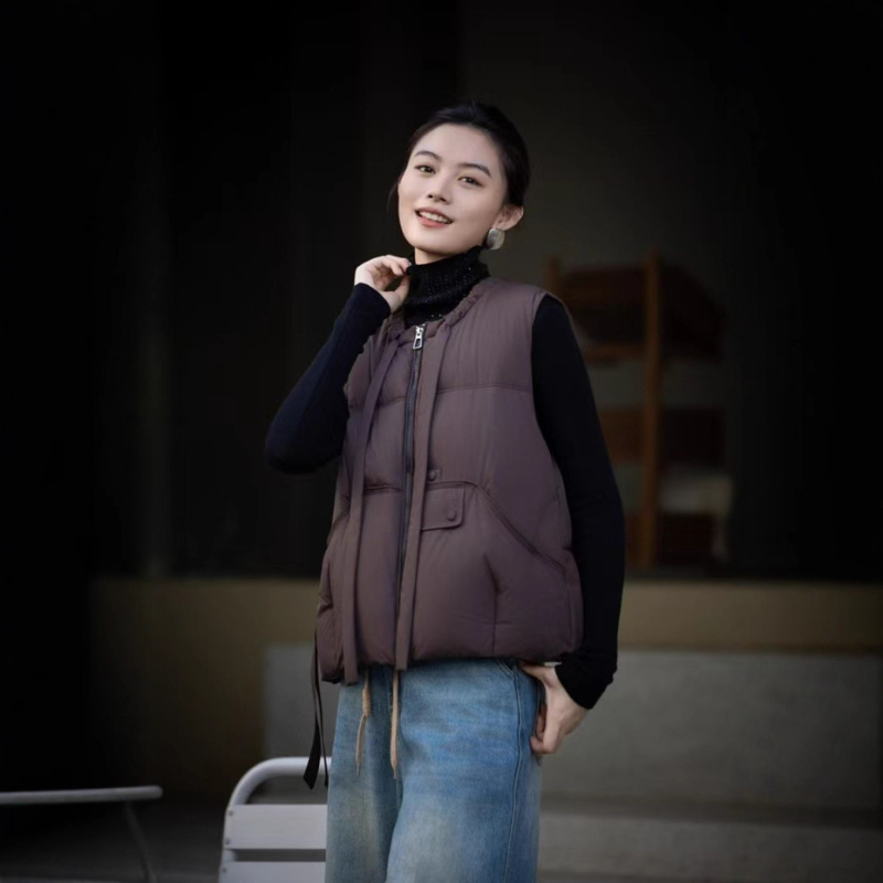 Ženska vesta s kačjim perjem, okrugli vrat, zip, slobodan kroj