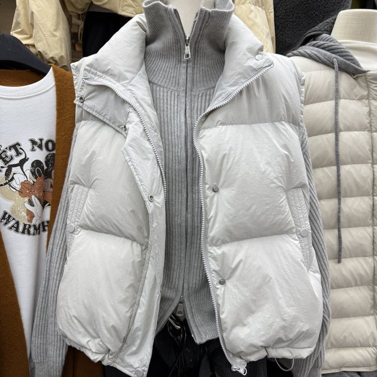 Sieviešu bez piedurknēm veste ar stāvu kaklu, rāvējslēdzēja aizdare, vienkrāsains modelis, pildījums no poliestera un kokvilnas, galvenā auduma sastāvs: poliesters