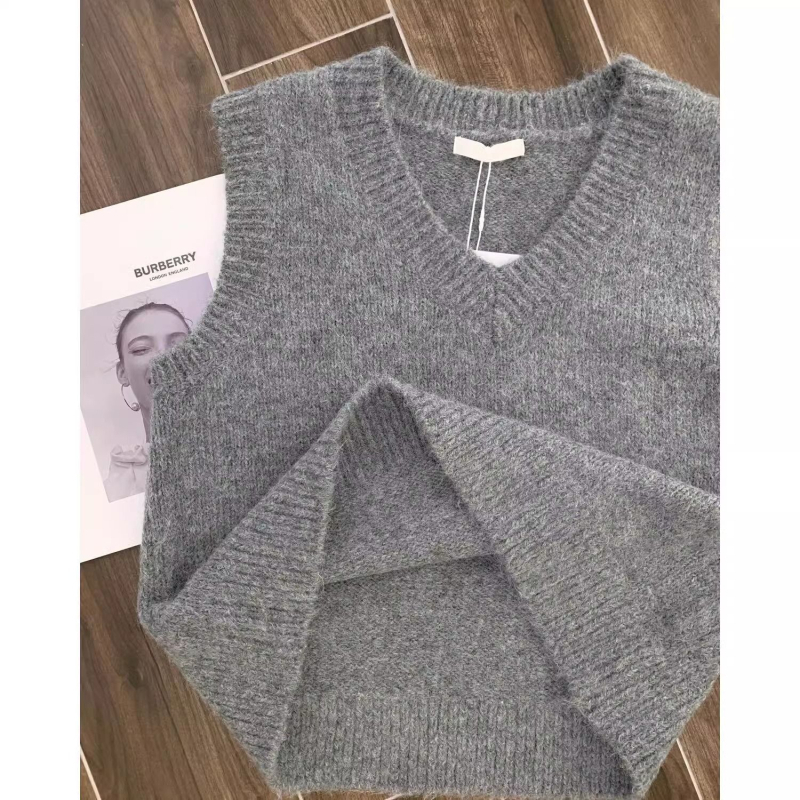 Ženski vest s polo ovratnikom, pleteni od pamuka s elastanom <30%, jednobojna, slobodan kroj, proljeće 2025