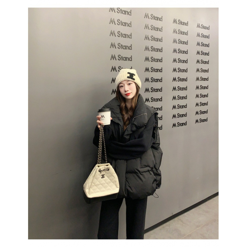 Sieviešu vestes ar stāvošu apkakli un rāvējslēdzēju, brīvs piegriezums, pūka-pamatu pildījums, poliestera audums