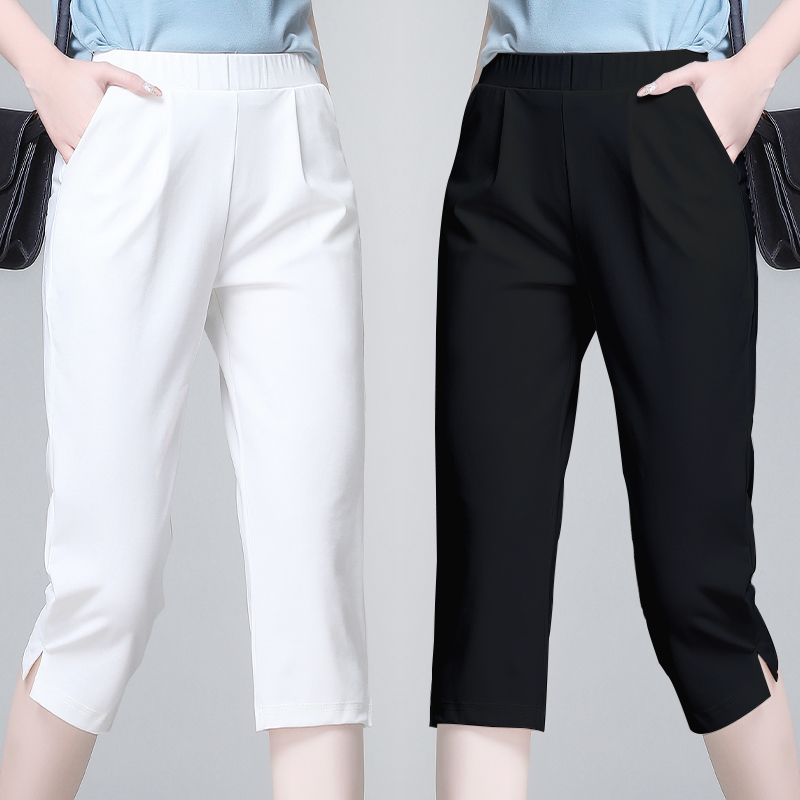 Dámske cropped nohavice z polyesteru, vysoký pás, mikroelastickosť, rovný strih, 50–70% polyester