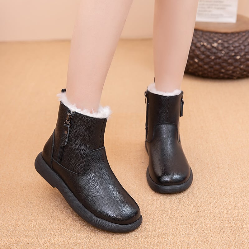 Női téli csizma valódi bőrből, gyapjúbéléssel, gumitalppal, alacsony sarokkal, kerek orral
