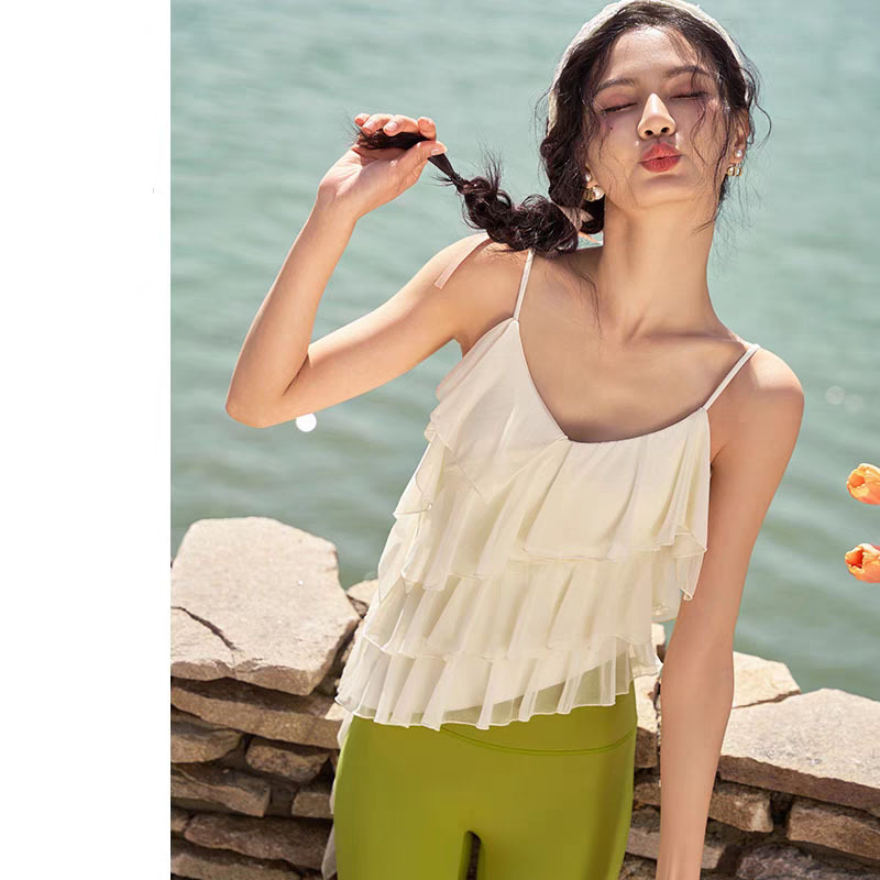 Γυναικείο τοπ γιόγκα Camisole με στρωτές ριφές και πίσω χωρίς τιράντες, με αποσπώμενες επενδύσεις στήθους, ύφασμα νάιλον, 75% βαμβάκι + 25% σπάντεξ, ακανόνιστο τελείωμα, ασύμμετρο σχέδιο