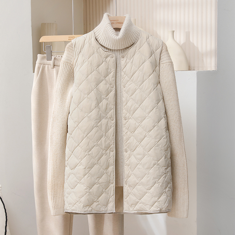 Vunena vestа bez rukava s punjenjem od patka perja, kašmir 51–55%, tanka, srednje duljine, V-izrez