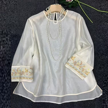 Organzas krekls ar izšuvumiem, garas piedurknes, apaļš kaklaizgriezums, brīvs piegriezums