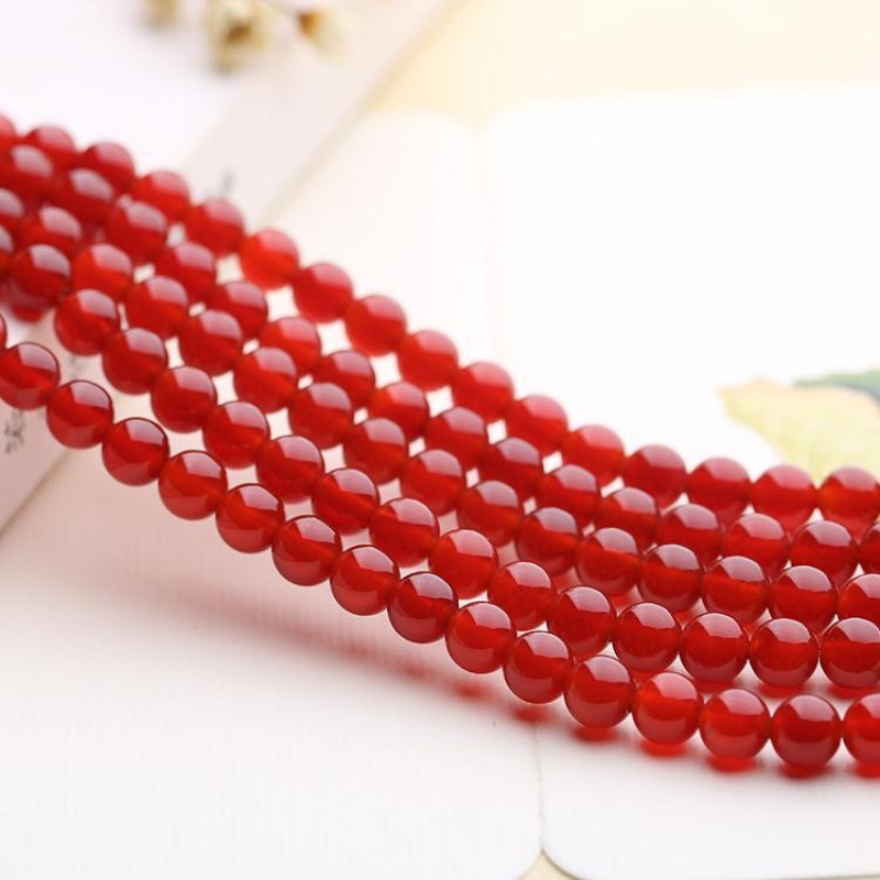 Perle din agate – lucioase, rotunde, stil lux ușor; modelul cum se vede în imagine