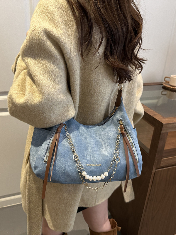 PU bőrből készült női táska, keresztpántos vállon át, függőleges téglalap alakú forma, cipzáras nyitás, belső telefontartó zseb