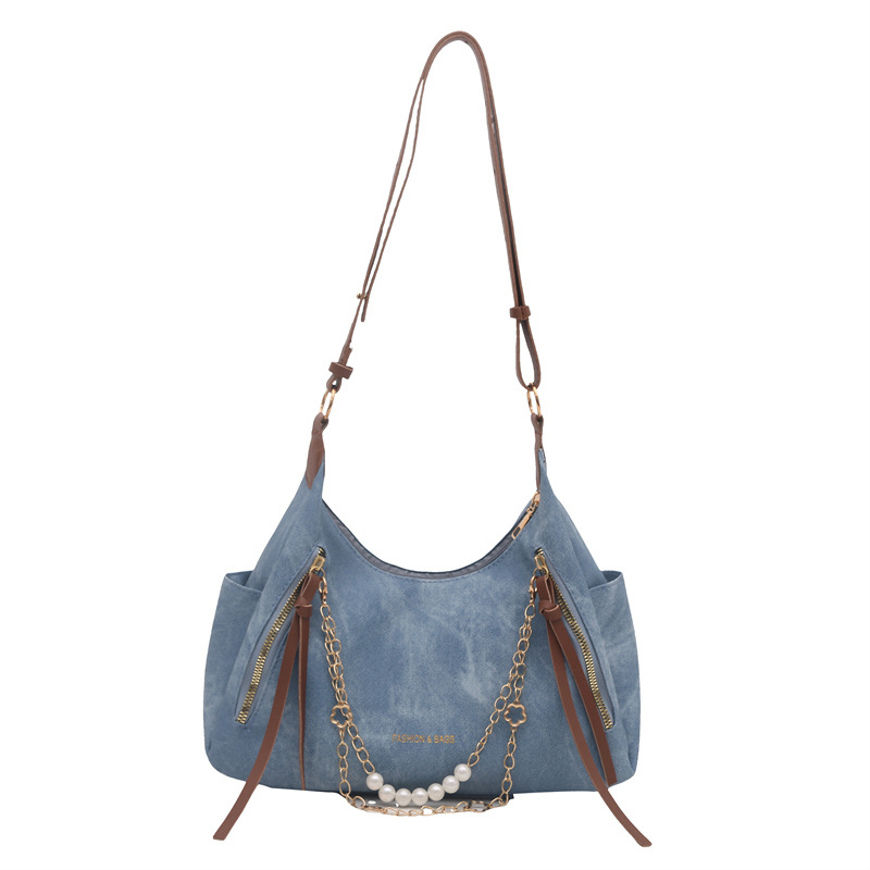 PU bőrből készült női táska, keresztpántos vállon át, függőleges téglalap alakú forma, cipzáras nyitás, belső telefontartó zseb