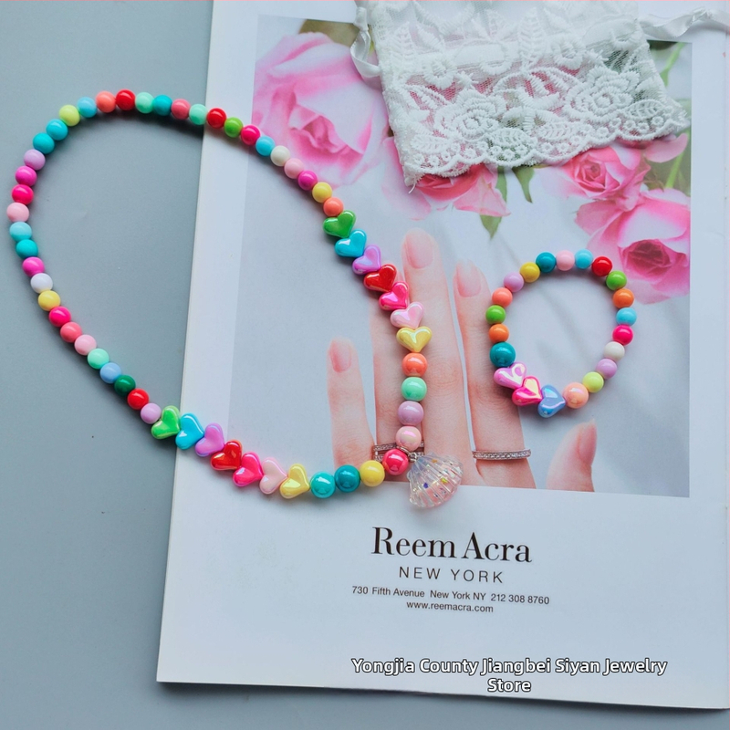 Laste südamekujuline kaelakee ja käevõru komplekt, käsitööplastist juveelid, kaks tükki, printsesside sari