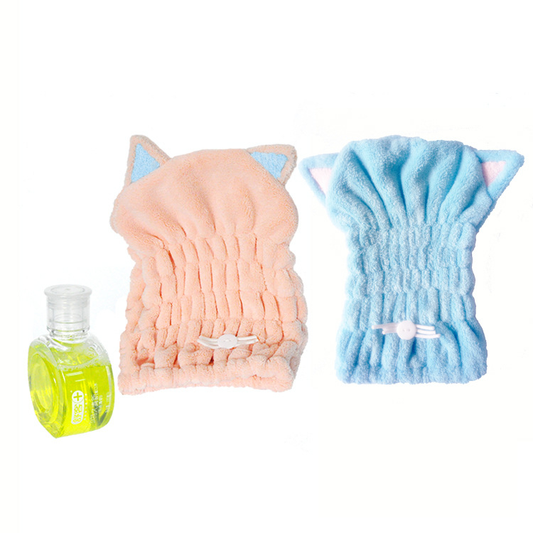 Macskaszőr fülű hajszárító sapka, korallflís mikroszálas, gyors száradású, puha kapucni; rostok poliészter és nylon; tömeg 50–79 g; 32 szál