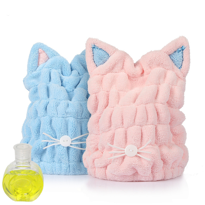 Macskaszőr fülű hajszárító sapka, korallflís mikroszálas, gyors száradású, puha kapucni; rostok poliészter és nylon; tömeg 50–79 g; 32 szál