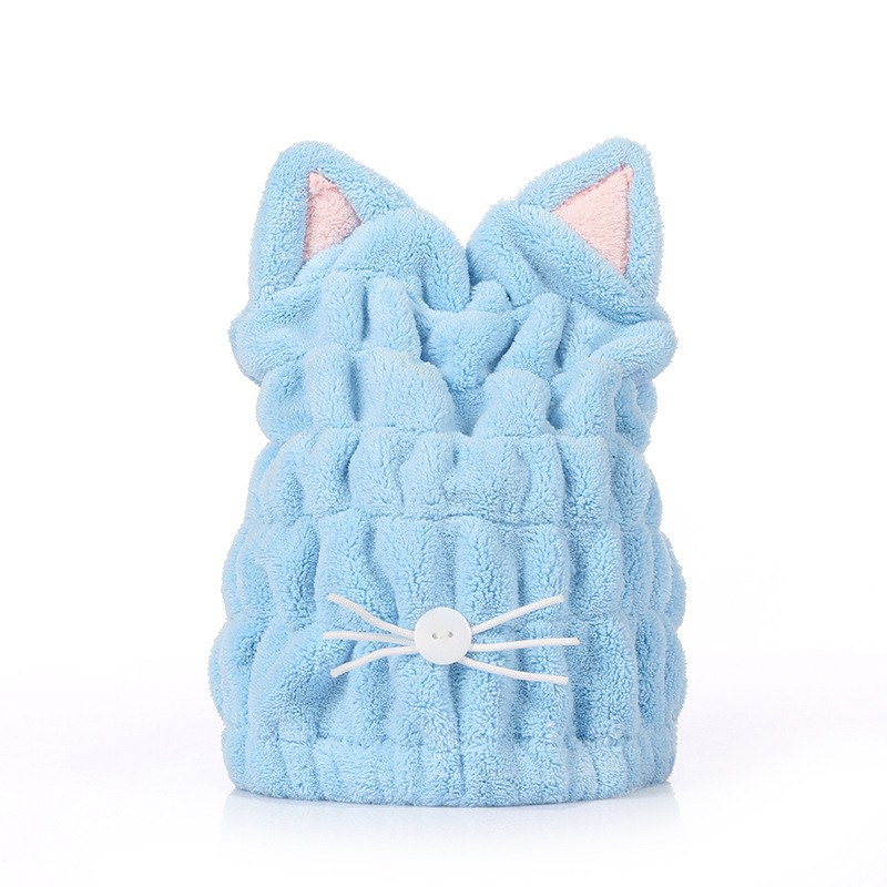 Macskaszőr fülű hajszárító sapka, korallflís mikroszálas, gyors száradású, puha kapucni; rostok poliészter és nylon; tömeg 50–79 g; 32 szál