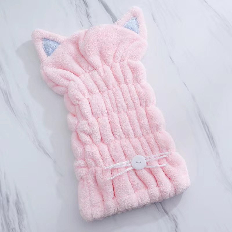 Macskaszőr fülű hajszárító sapka, korallflís mikroszálas, gyors száradású, puha kapucni; rostok poliészter és nylon; tömeg 50–79 g; 32 szál