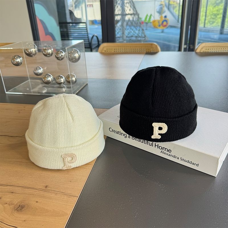 Pletena dječja kapa, kupolasti vrh, bez obruba, akril 81–95%, zima, za 6–12 mjeseci