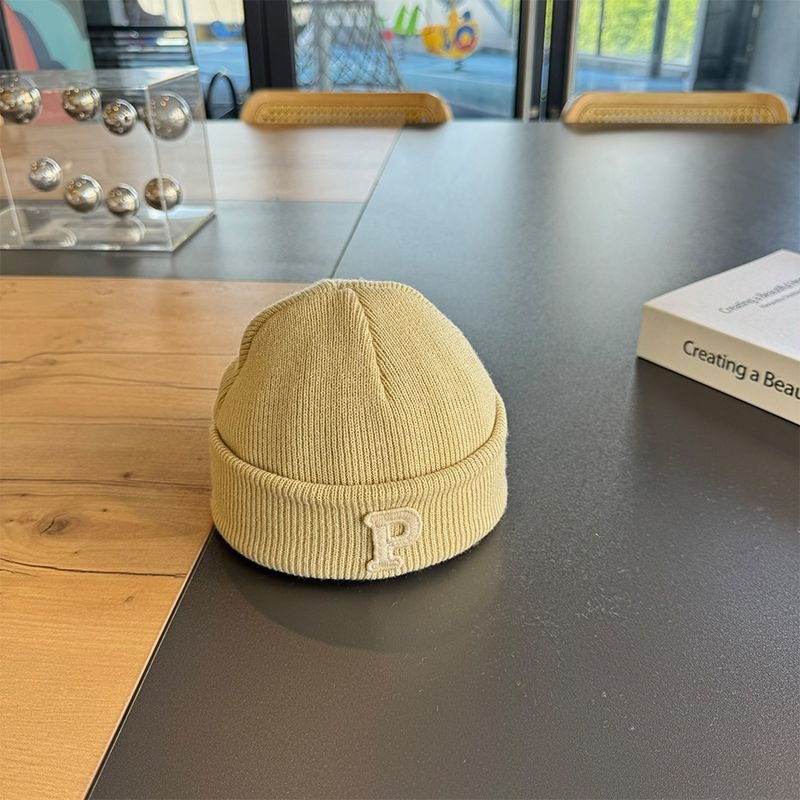 Pletena dječja kapa, kupolasti vrh, bez obruba, akril 81–95%, zima, za 6–12 mjeseci