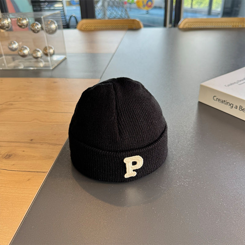 Pletena dječja kapa, kupolasti vrh, bez obruba, akril 81–95%, zima, za 6–12 mjeseci