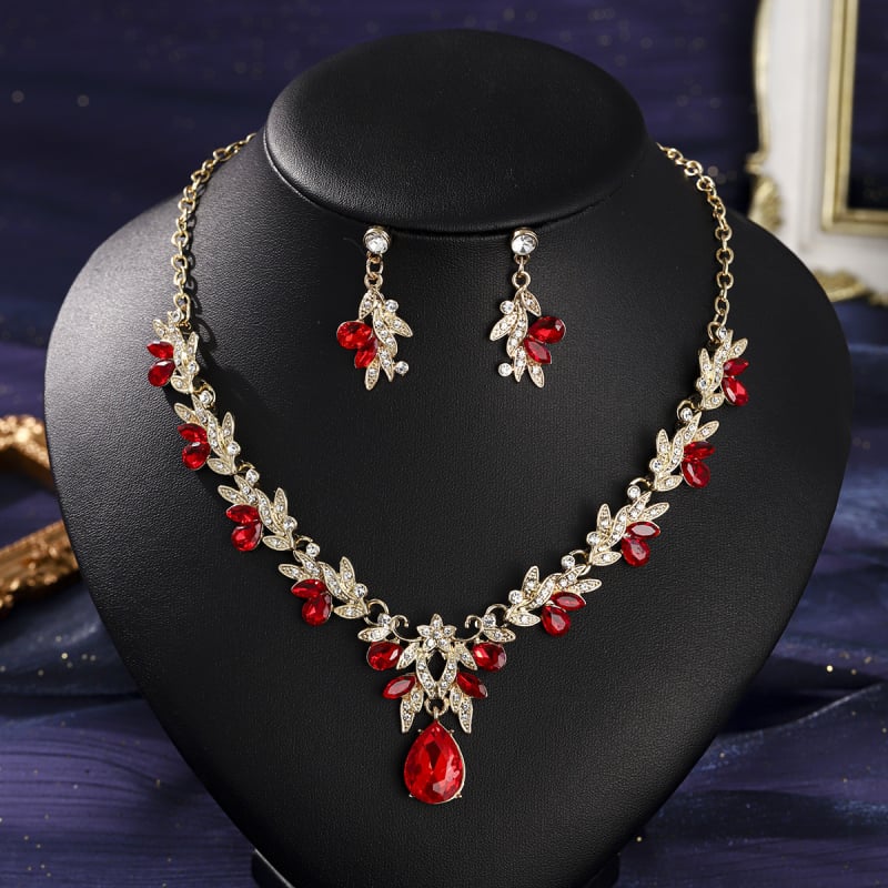 Ékszerszett: fülbevalók és nyaklánc cinkötvözetből, rhinestone medálokkal, virág-levél motívumok, egyszerű lánc