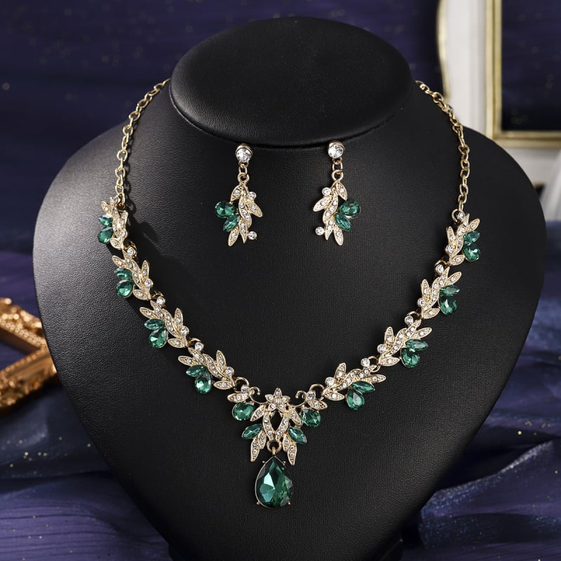 Ékszerszett: fülbevalók és nyaklánc cinkötvözetből, rhinestone medálokkal, virág-levél motívumok, egyszerű lánc