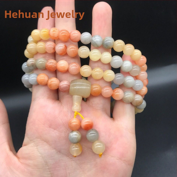 108 gyöngyből álló karkötő, többszintű tekerhető medállal