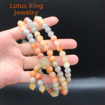 108 gyöngyből álló karkötő, többszintű tekerhető medállal