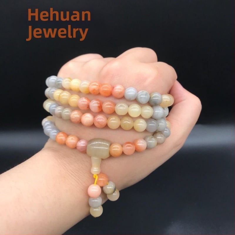 108 gyöngyből álló karkötő, többszintű tekerhető medállal