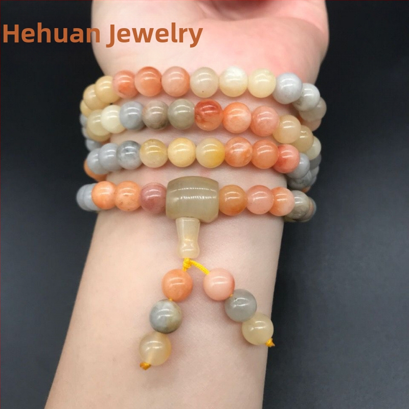 108 gyöngyből álló karkötő, többszintű tekerhető medállal