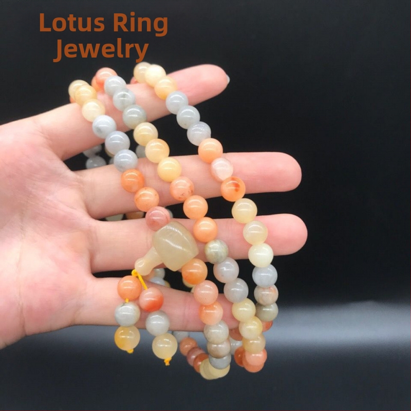 108 gyöngyből álló karkötő, többszintű tekerhető medállal