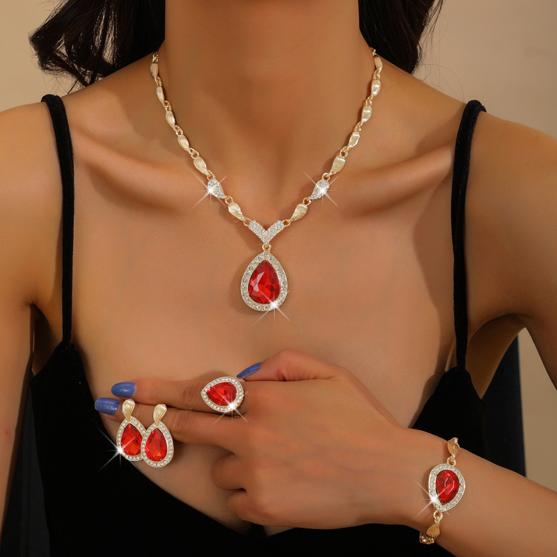 Set nakita od legure s Rhinestone: ogrlica s križnim lancem, naušnice, prsten i narukvica