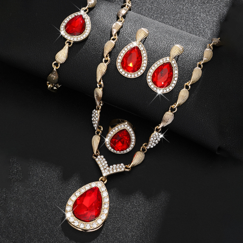 Set nakita od legure s Rhinestone: ogrlica s križnim lancem, naušnice, prsten i narukvica