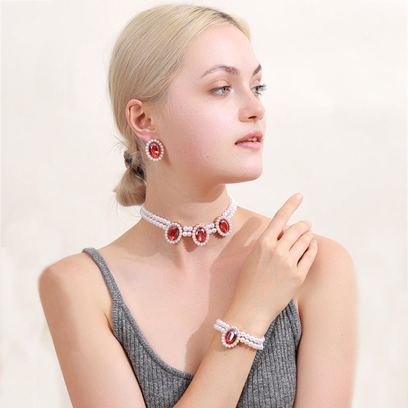 Set nakita od umjetnih perli i rhinestona, dvostruko slojevito lanac za ključnu kost, naušnice i narukvica