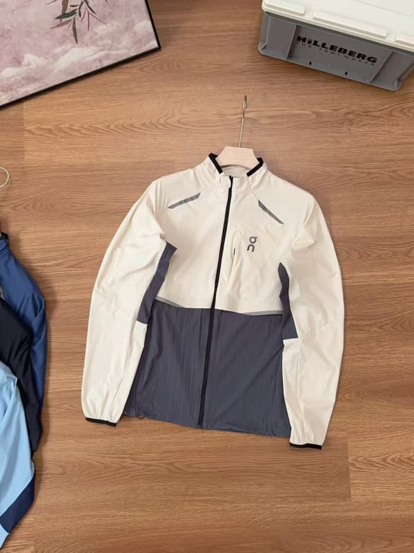 Яке за бягане – леко, с лепени шевове; UPF40+ слънцезащита; дишаща памук-полиестер смес; дълги ръкави с цип; корейски/японски свободен стил