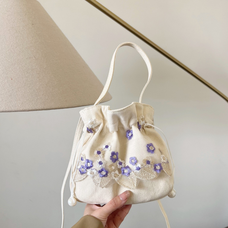 Youxuan уличен стил платнена bucket bag с капак; затваряне с връзка; подплата полиестер; презрамка единична