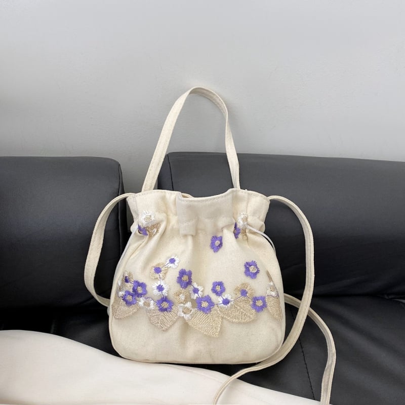 Youxuan уличен стил платнена bucket bag с капак; затваряне с връзка; подплата полиестер; презрамка единична