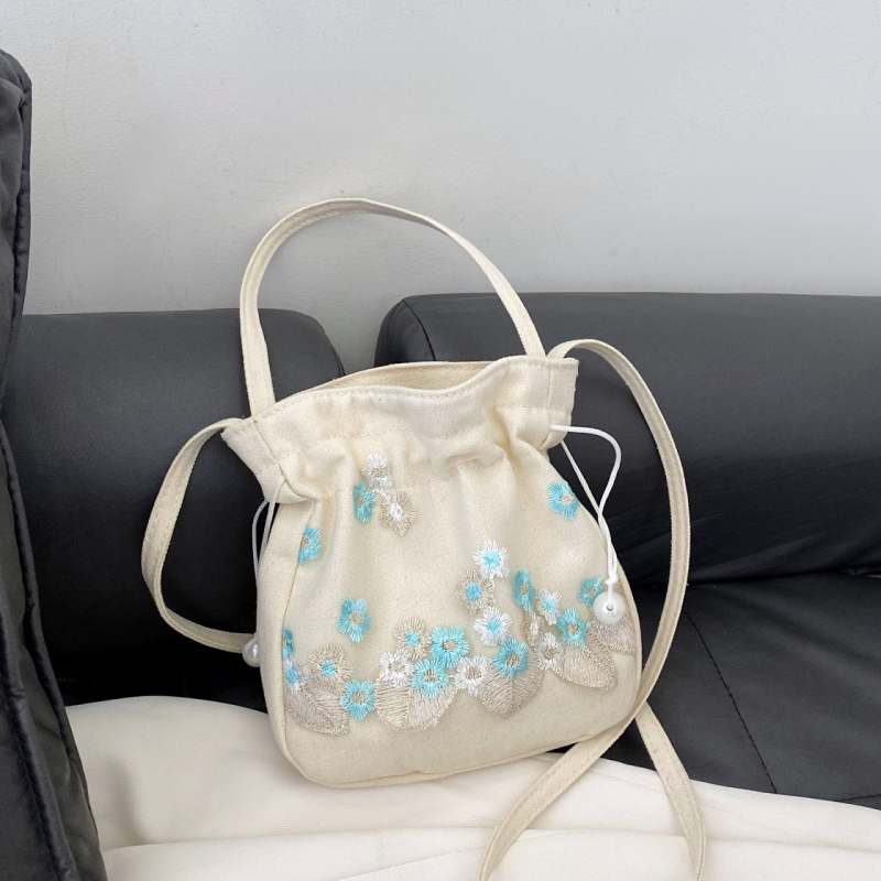 Youxuan уличен стил платнена bucket bag с капак; затваряне с връзка; подплата полиестер; презрамка единична