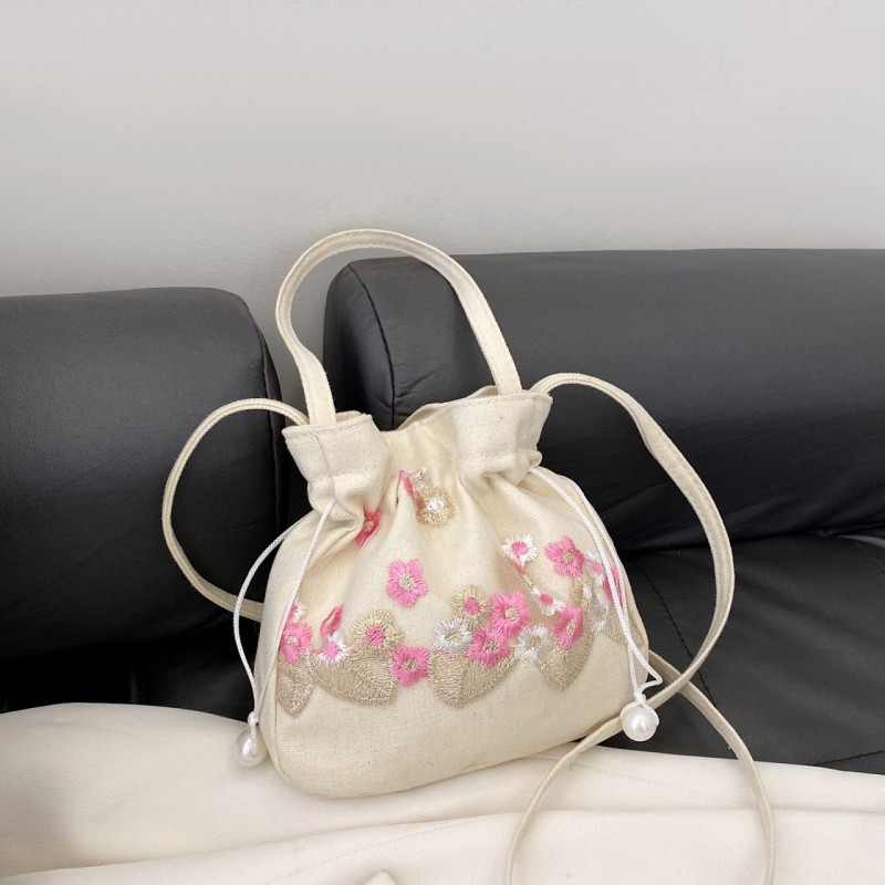 Youxuan уличен стил платнена bucket bag с капак; затваряне с връзка; подплата полиестер; презрамка единична