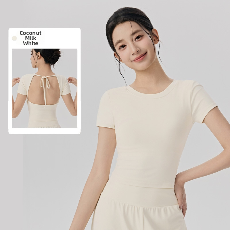 Sieviešu jogas tops ar iekšējiem krūšu spilventiem, īsām piedurknēm, cieši pieguļošs, divpusēji izbrūzēts audums, 78% neilons, 22% spandekss